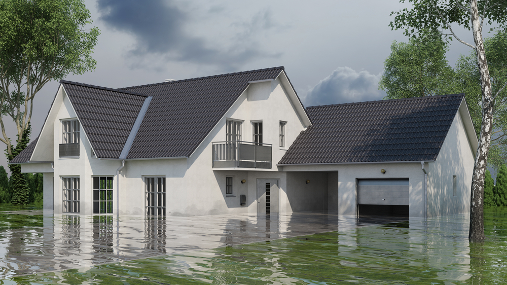 single family home flooded with water up to garage door